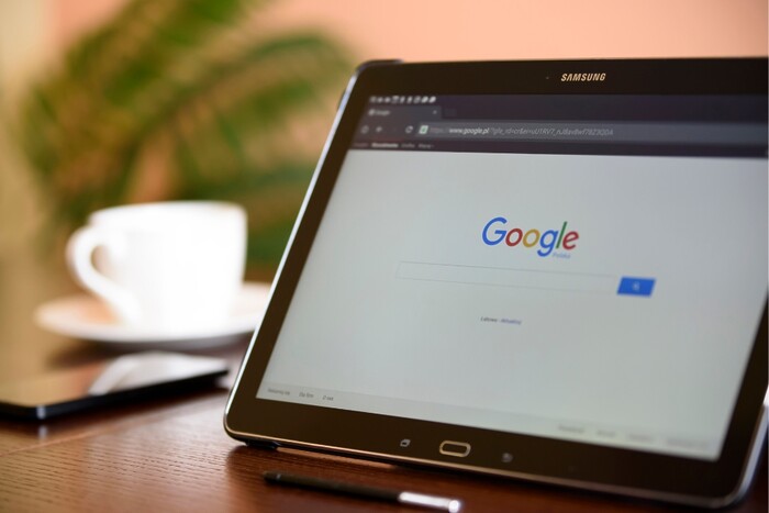 A tablet opened to Google.
