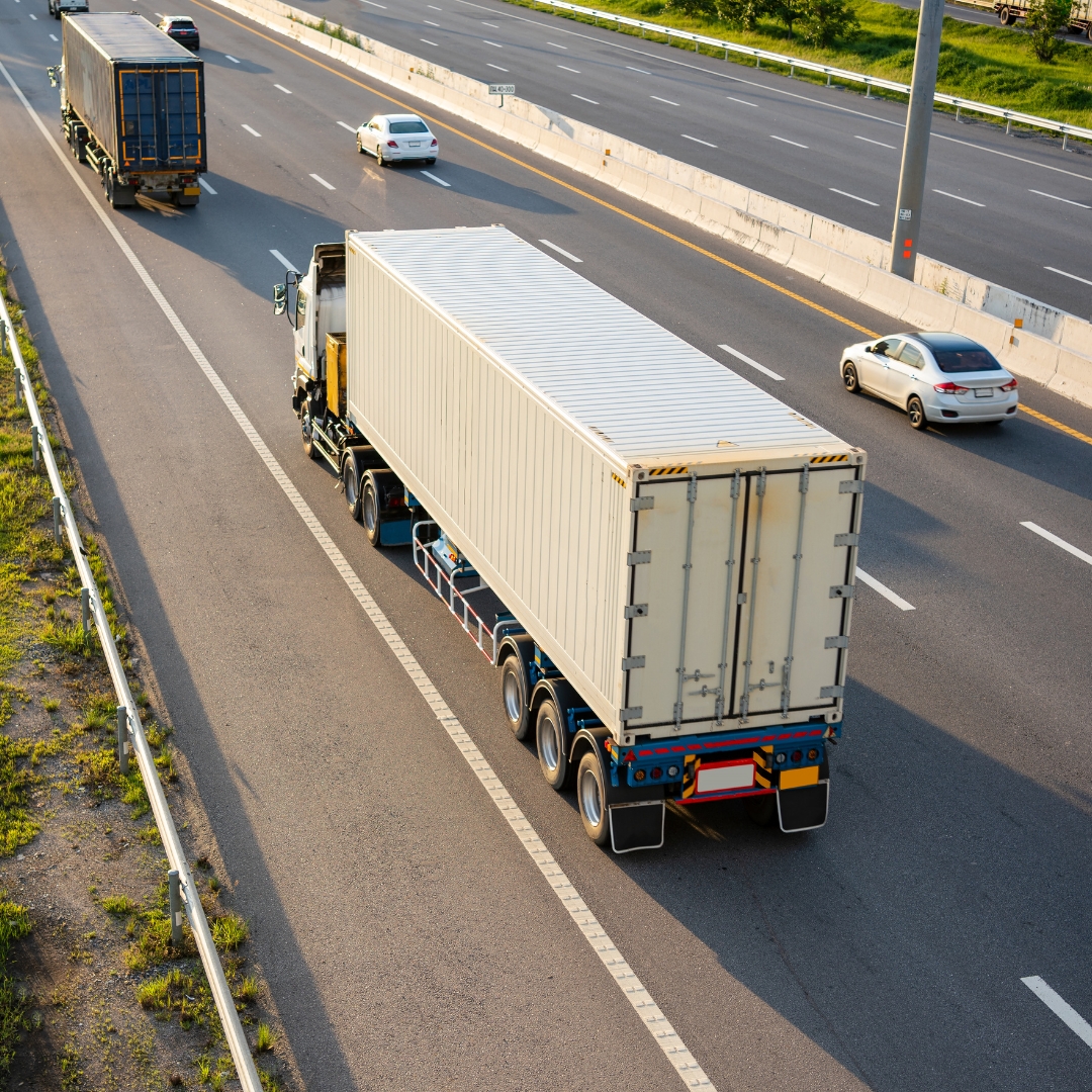 Trucks and cars on multi lane road