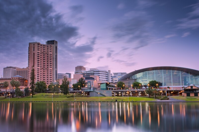 Adelaide at dusk with buildings reflected in water